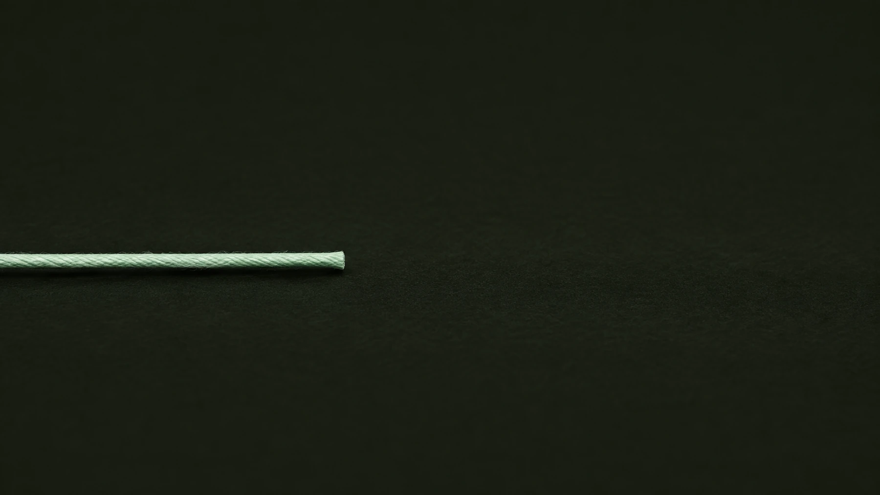 A cord cut cleanly in two, illustrating an interrupted call.